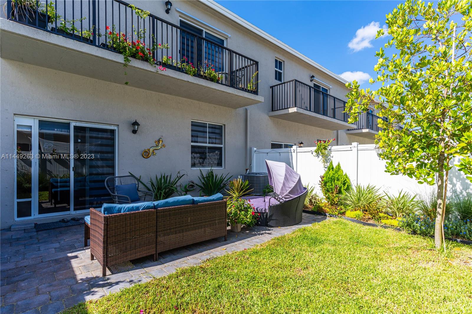 781 Southeast 19th Street Homestead, FL 33034 - Photo 39 of 41 a view of a house with backyard and sitting area