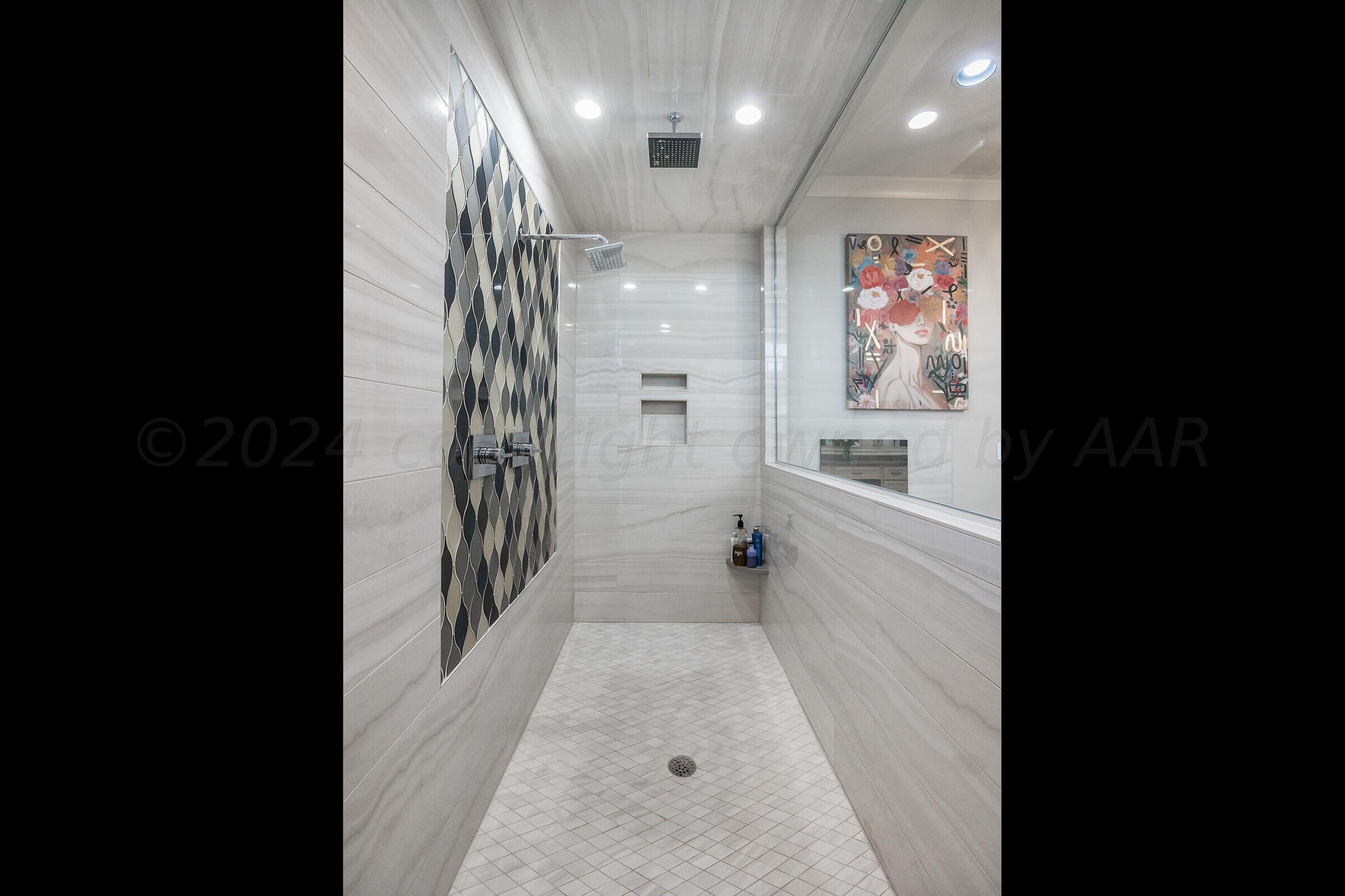 8307 Georgetown Drive Amarillo, TX 79119 - Photo 21 of 46 a view of a hallway with wooden floor