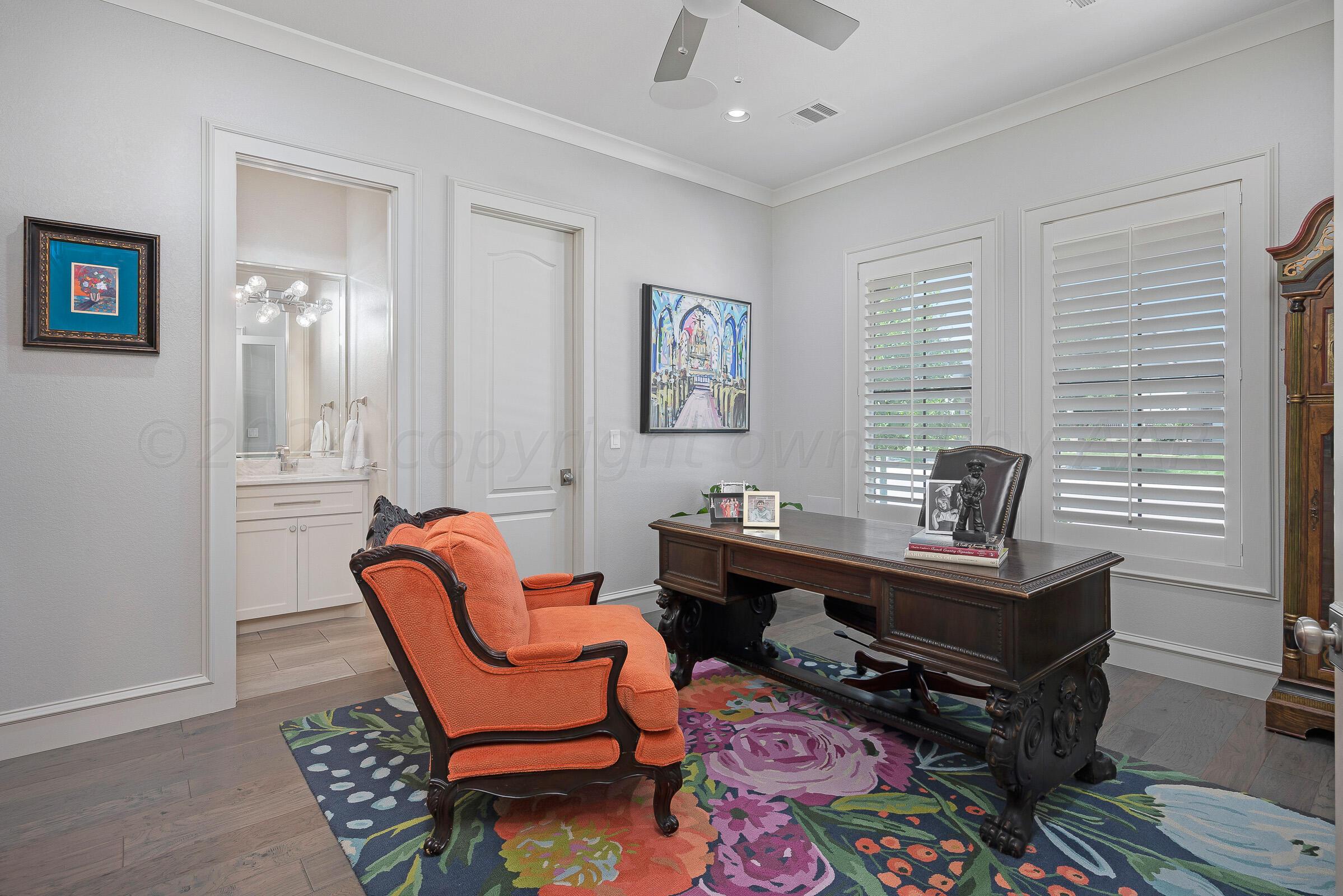 8307 Georgetown Drive Amarillo, TX 79119 - Photo 22 of 46 a view of a workspace with furniture and a window