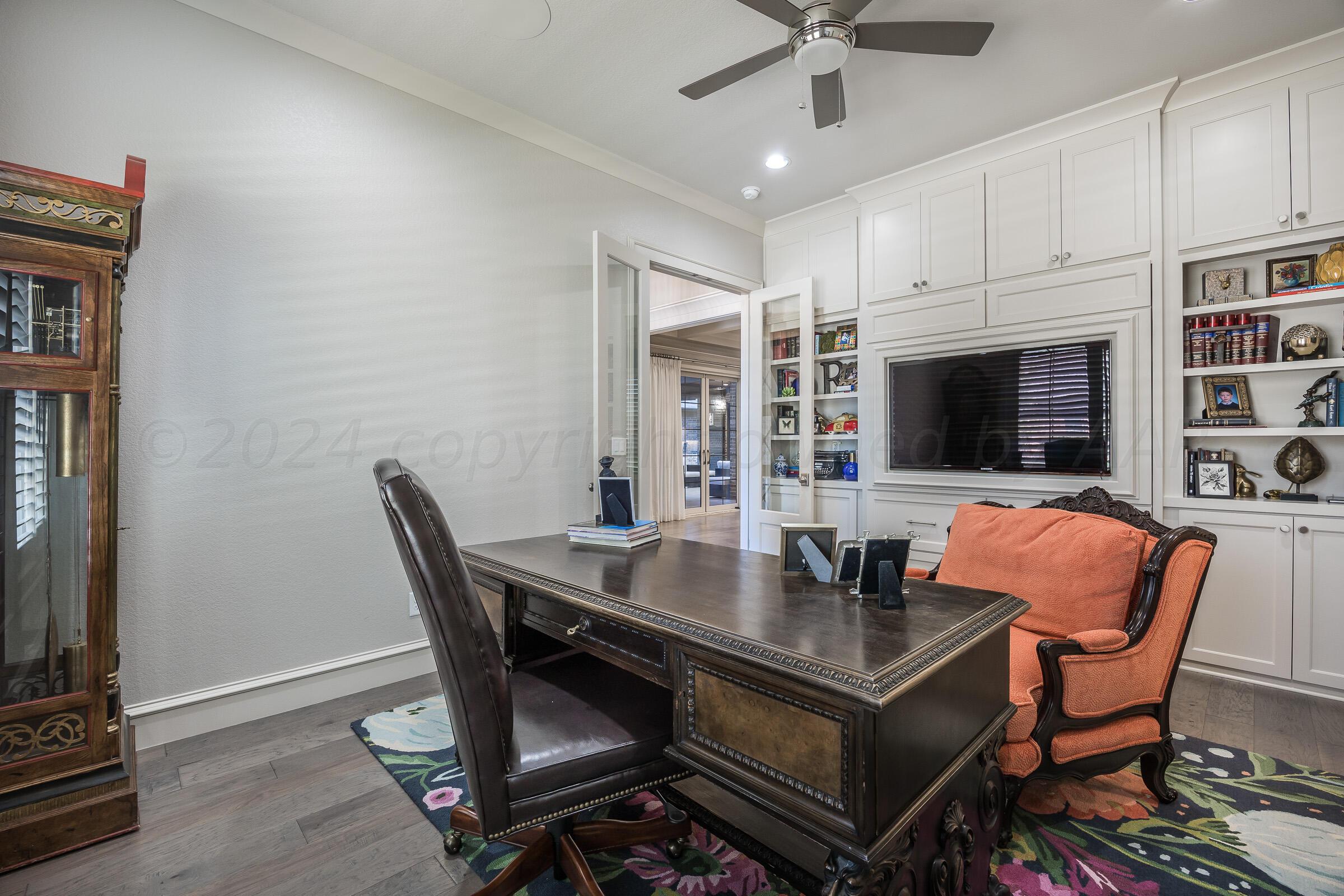 8307 Georgetown Drive Amarillo, TX 79119 - Photo 23 of 46 a outdoor dining space with furniture and a flat screen tv