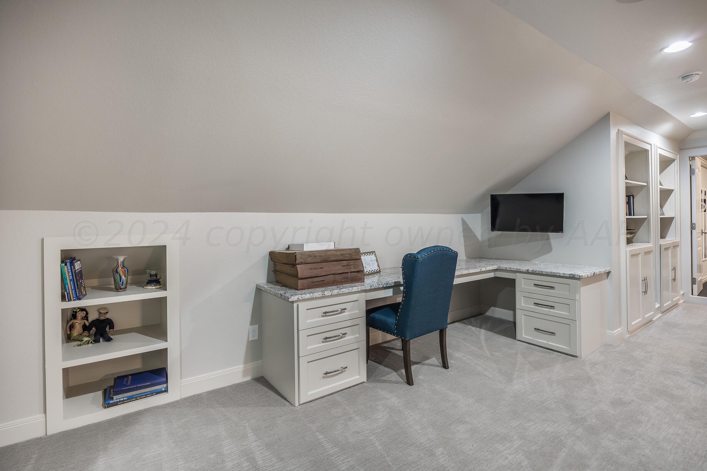 8307 Georgetown Drive Amarillo, TX 79119 - Photo 30 of 46 a view of a workspace with furniture