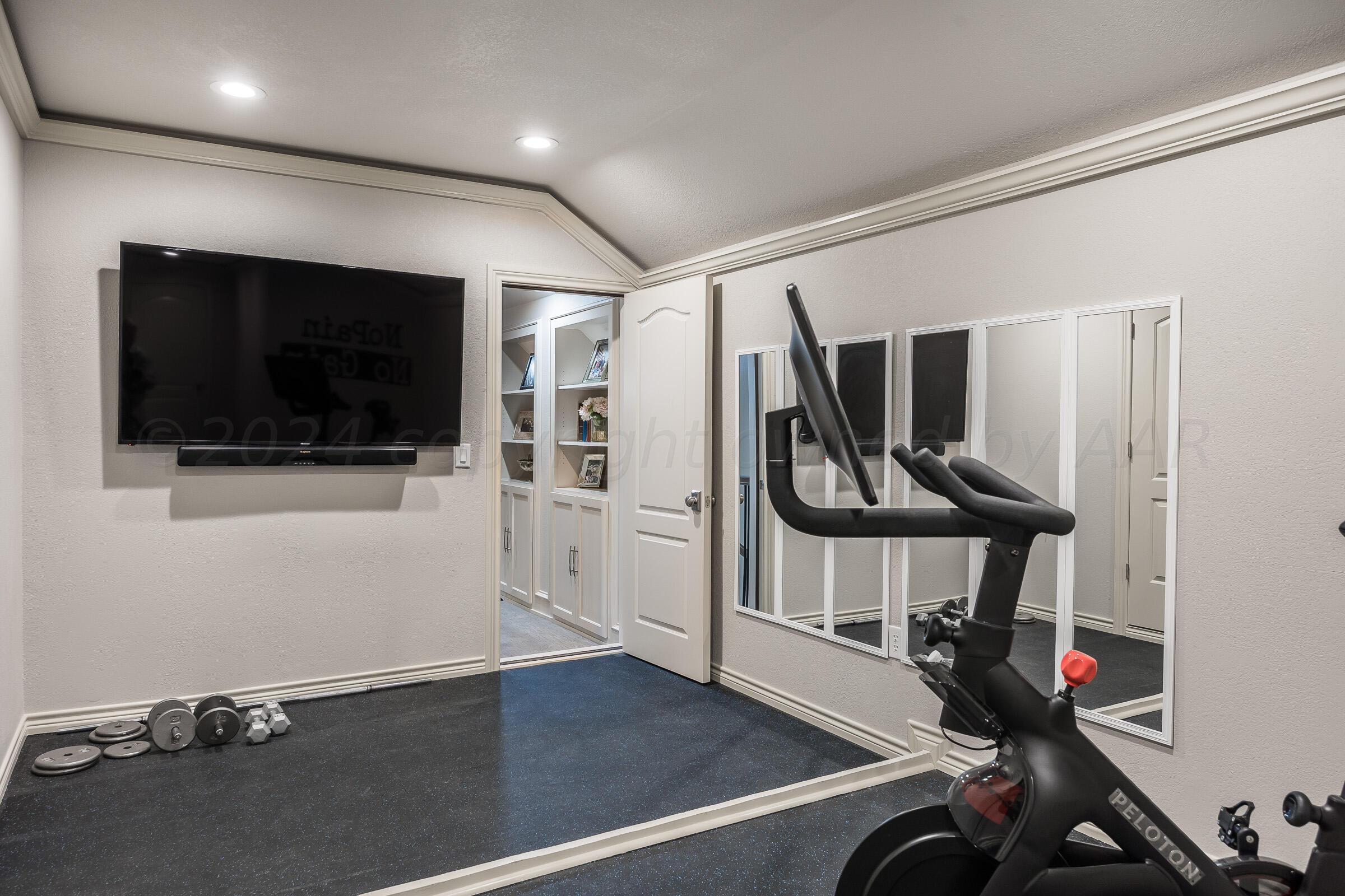 8307 Georgetown Drive Amarillo, TX 79119 - Photo 33 of 46 a view of a room with gym equipment
