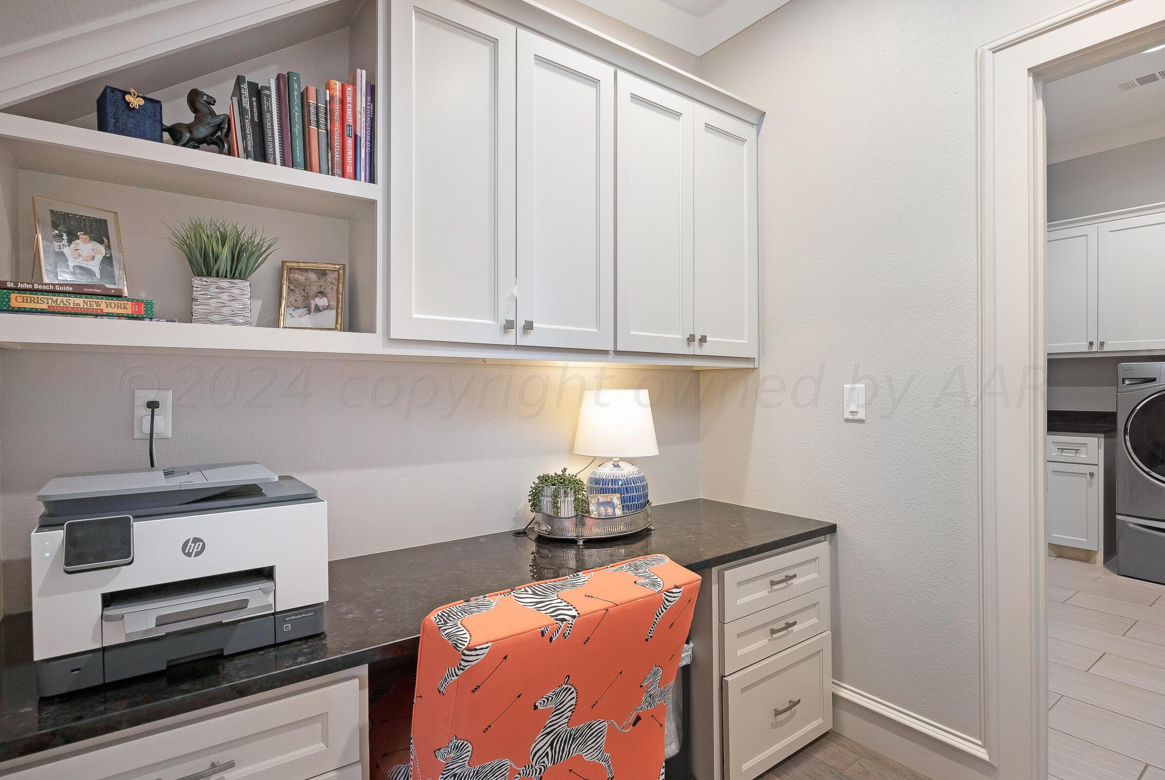 8307 Georgetown Drive Amarillo, TX 79119 - Photo 35 of 46 a kitchen with stainless steel appliances granite countertop a stove and a cabinets