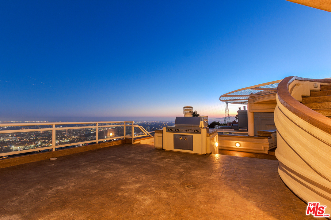 8570 Cole Crest Drive Los Angeles, CA 90046 - Photo 27 of 28 a view of a room with gym equipment