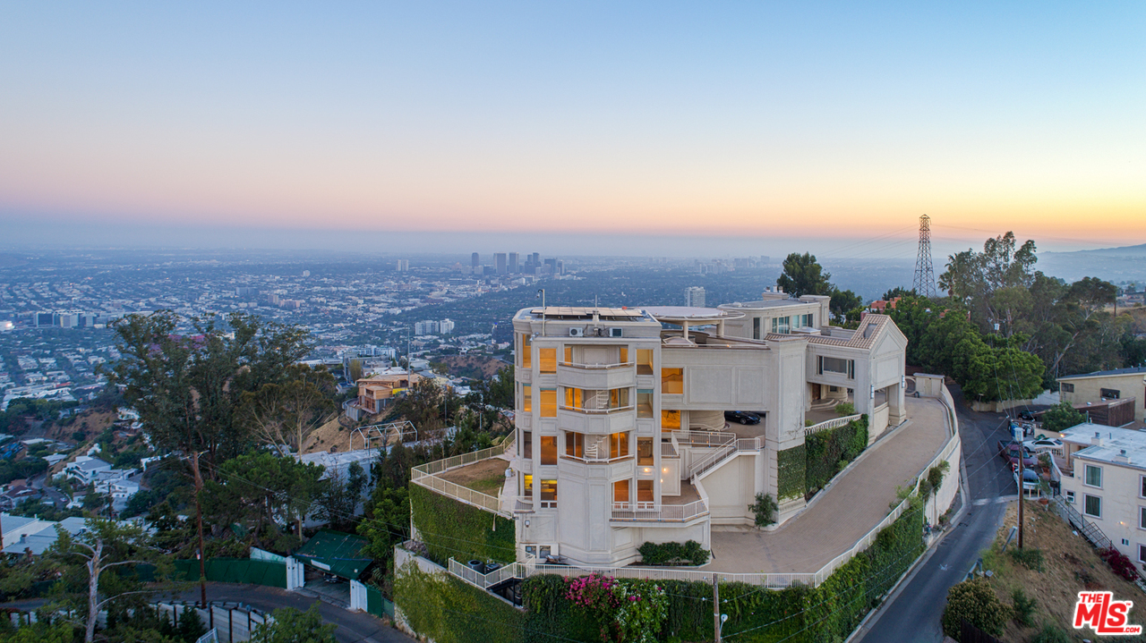 8570 Cole Crest Drive Los Angeles, CA 90046 - Photo 6 of 28 an aerial view of residential houses with outdoor space and trees