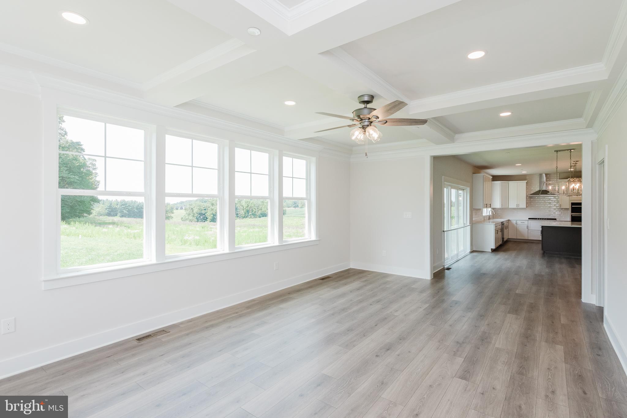1605 Oakland Road Freeland, MD 21053 - Photo 25 of 57 a view of an empty room with a window and wooden floor