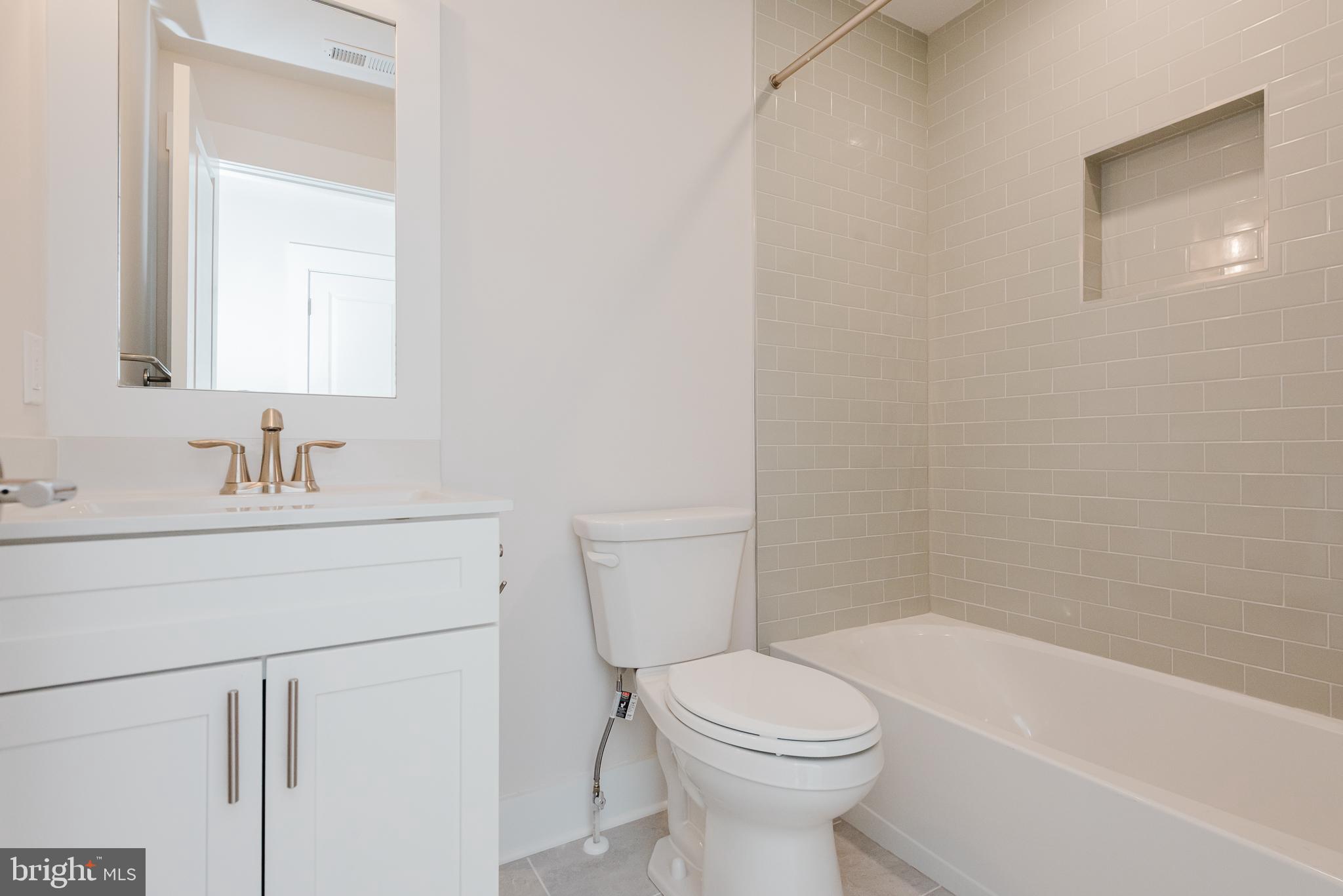 1605 Oakland Road Freeland, MD 21053 - Photo 35 of 57 a bathroom with a sink toilet and shower