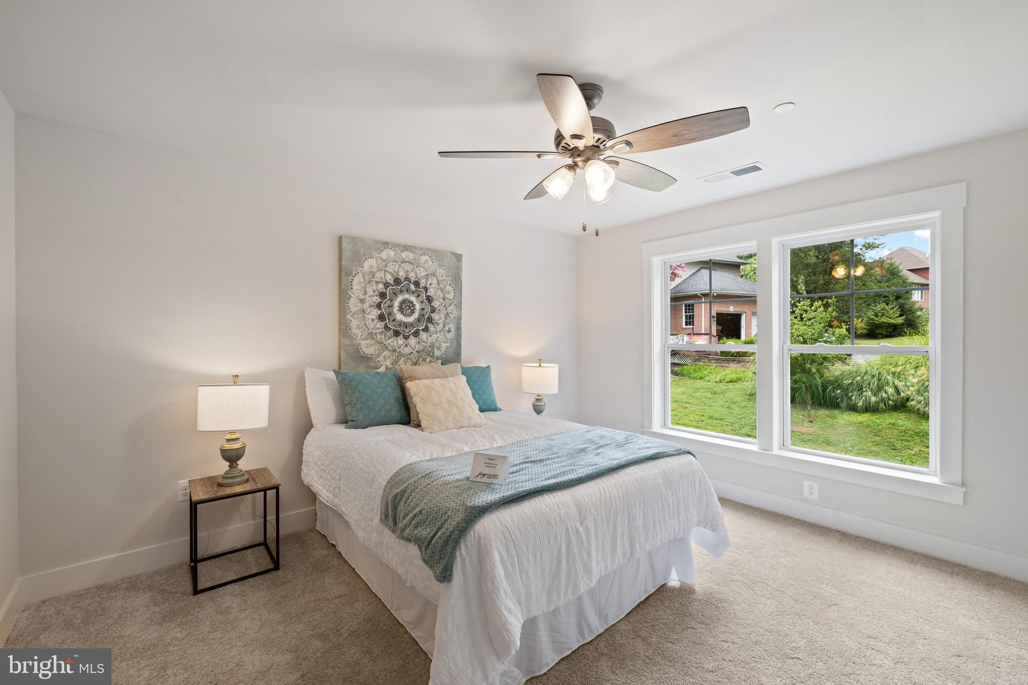 1605 Oakland Road Freeland, MD 21053 - Photo 36 of 57 a bedroom with a large bed and a chandelier