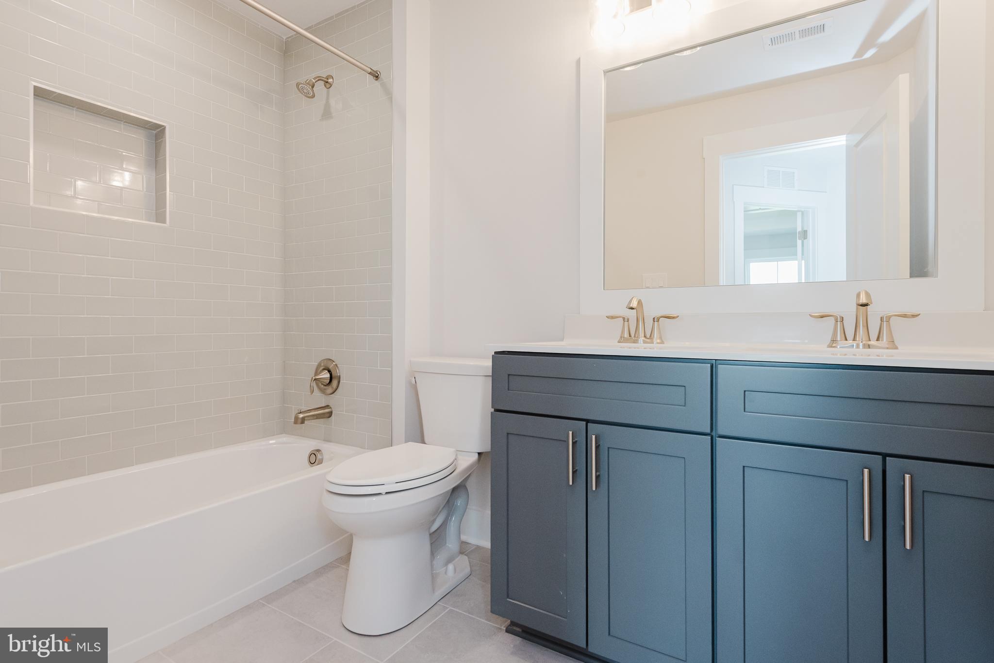 1605 Oakland Road Freeland, MD 21053 - Photo 38 of 57 a bathroom with a sink toilet and shower