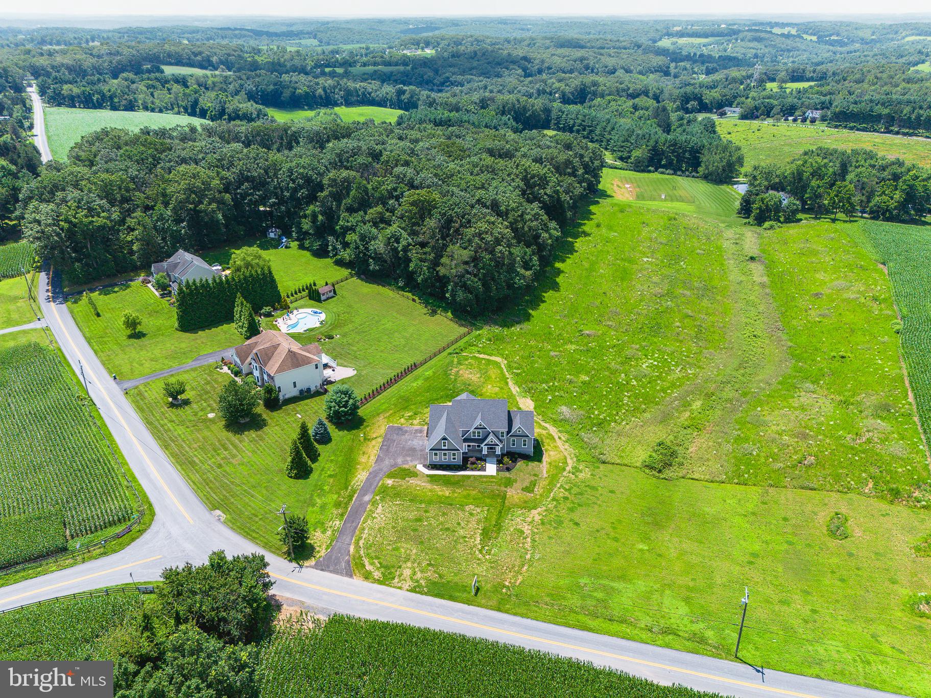 1605 Oakland Road Freeland, MD 21053 - Photo 44 of 57 an aerial view of a residential houses with outdoor space and street view