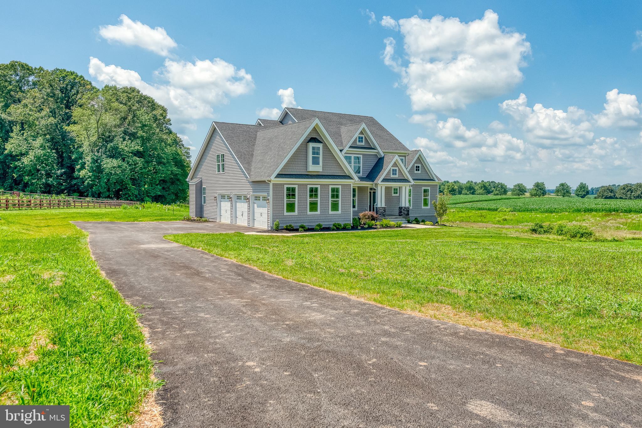 1605 Oakland Road Freeland, MD 21053 - Photo 56 of 57 a view of a big yard with table and chairs plants and large trees