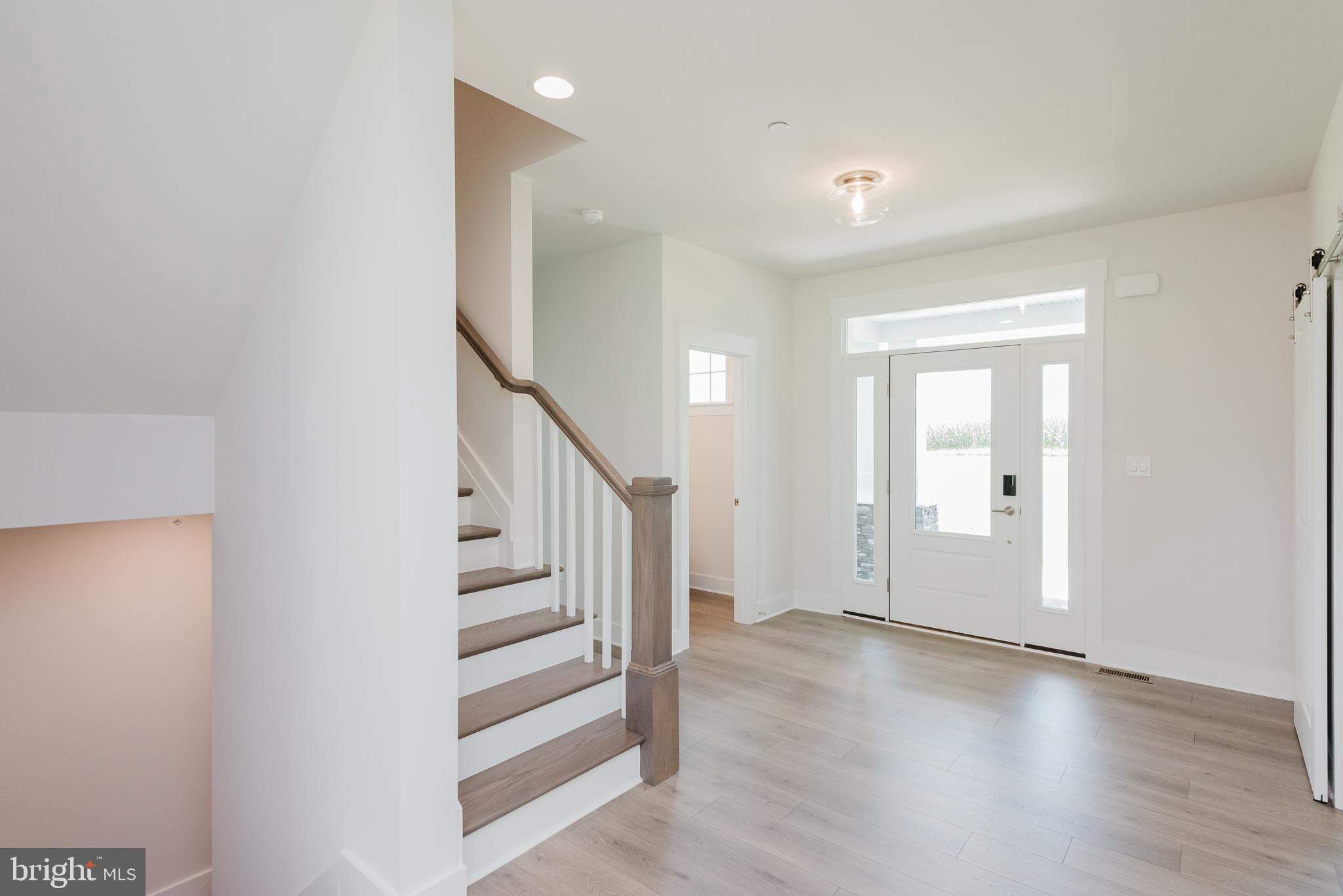 1605 Oakland Road Freeland, MD 21053 - Photo 6 of 57 a view of a hallway with wooden floor and entryway