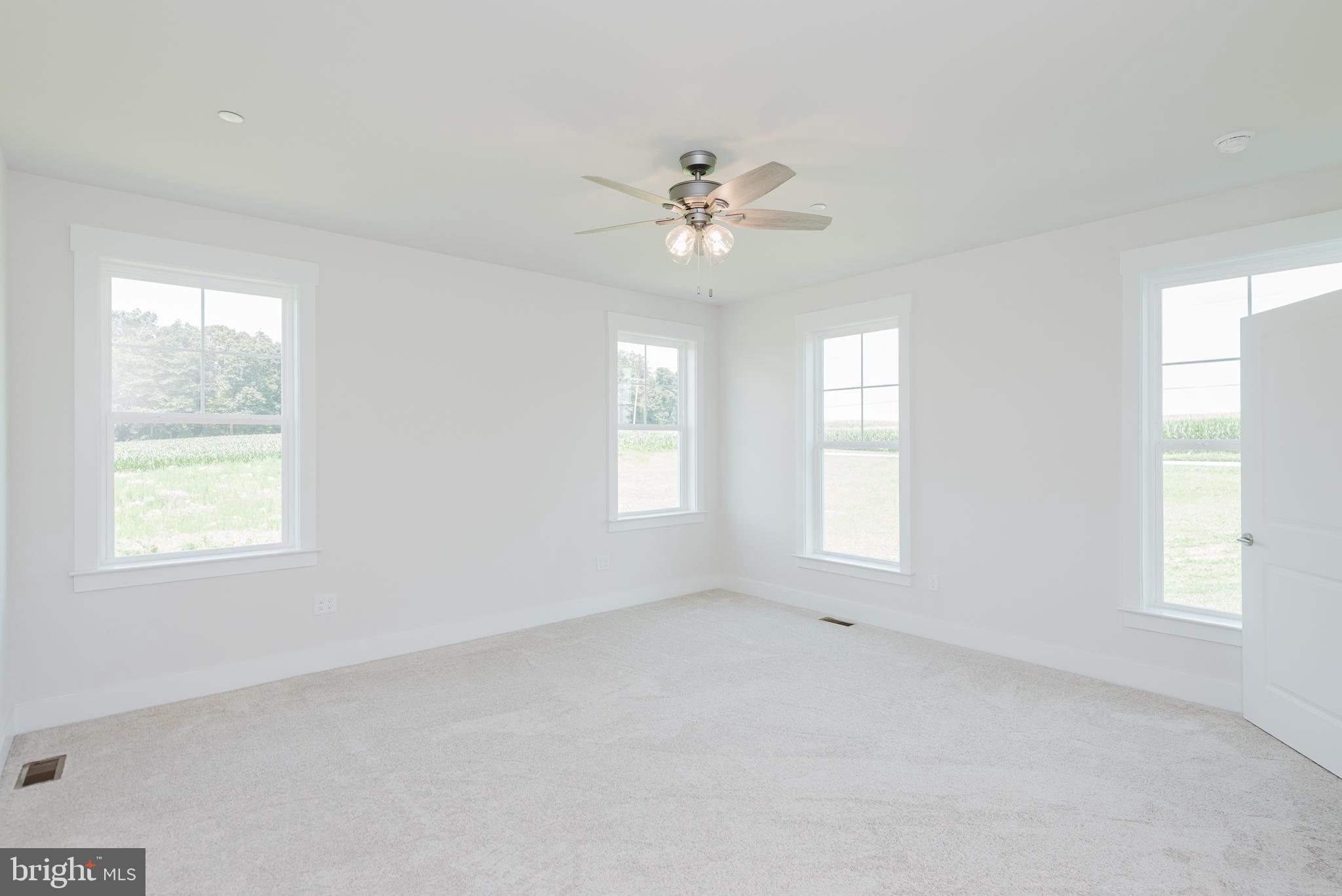 1605 Oakland Road Freeland, MD 21053 - Photo 9 of 57 a view of an empty room with a window