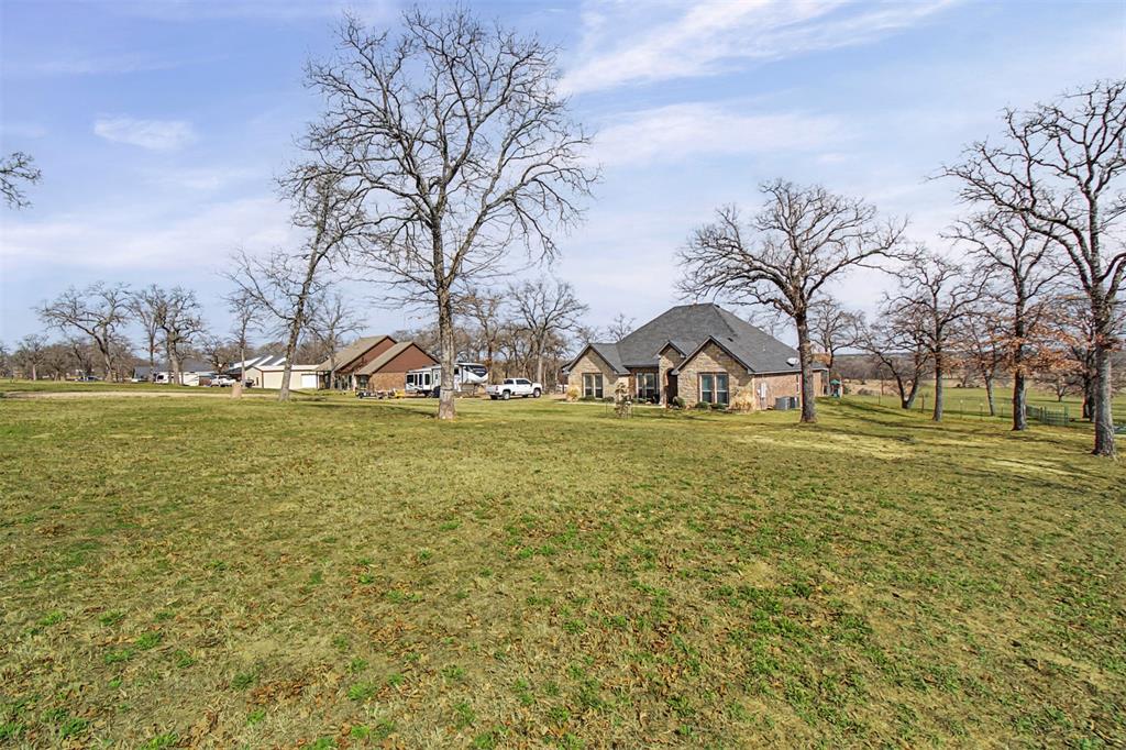 793 County Road 2535 Decatur, TX 76234 - Photo 35 of 39 a view of yard with tree