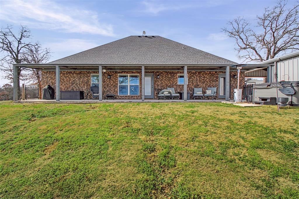 793 County Road 2535 Decatur, TX 76234 - Photo 6 of 39 a view of a house with a yard and sitting area
