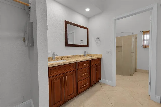 a view of a storage & utility room with a washer dryer