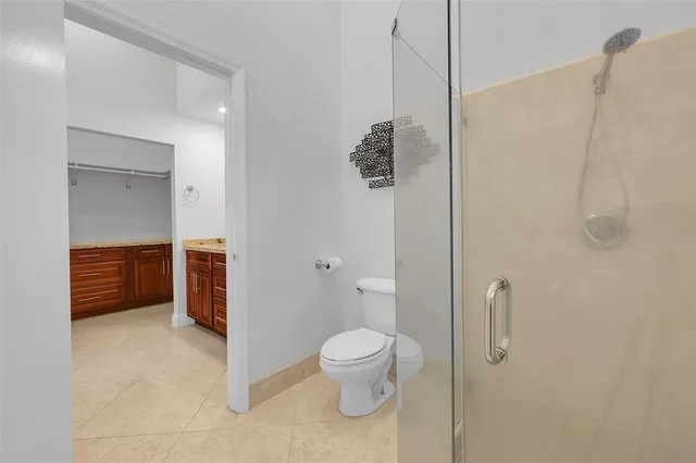 a view of a backyard with a patio