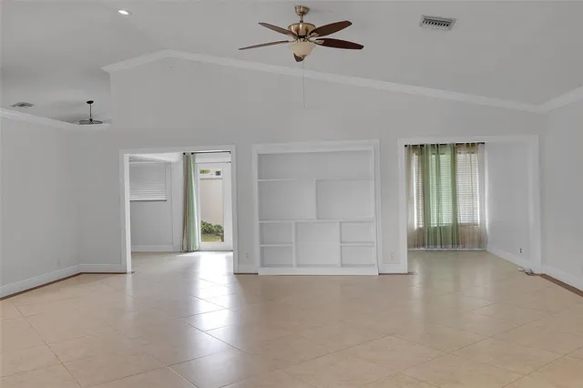 a kitchen with stainless steel appliances granite countertop a refrigerator sink and cabinets