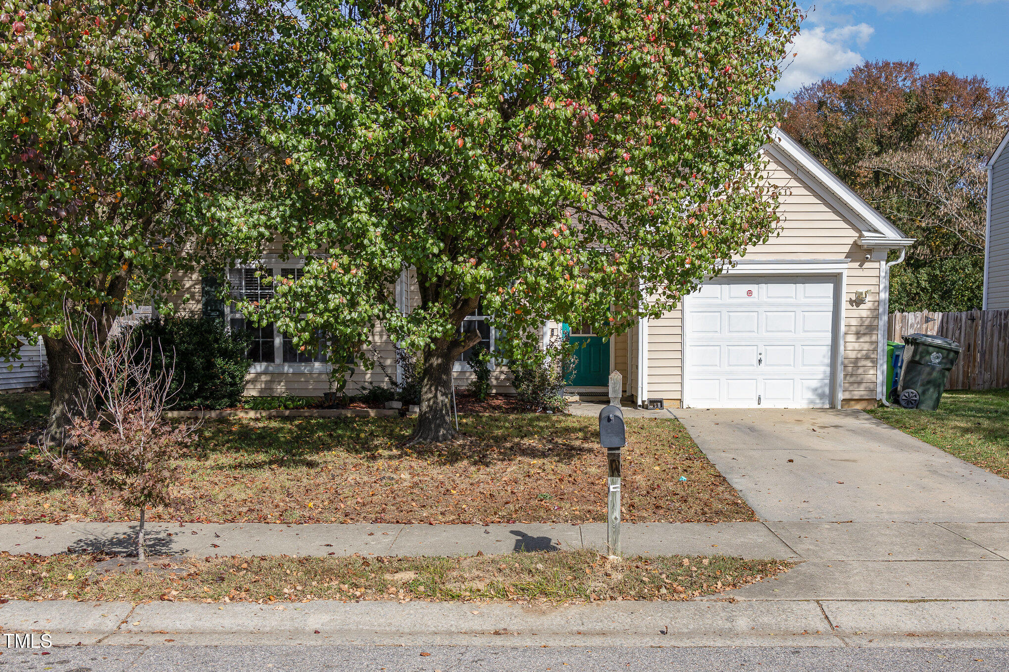 4331 Crowfield Drive Raleigh, NC 27610 - Photo 3 of 26 a view of a house with a yard