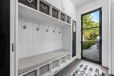 a view of a hallway with windows