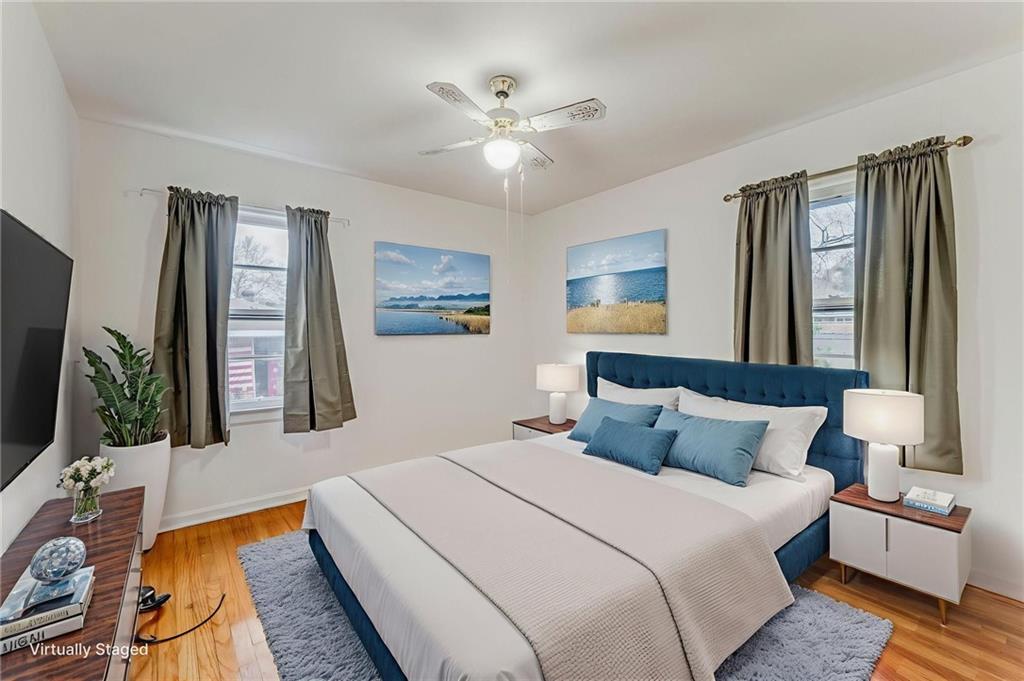 6 Don Drive Northeast Rome, GA 30165 - Photo 11 of 42 a bedroom with a large bed and a window