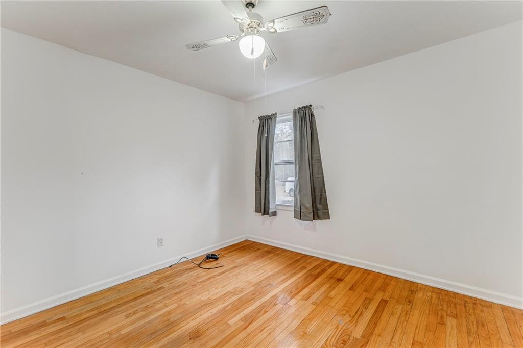 6 Don Drive Northeast Rome, GA 30165 - Photo 12 of 42 an empty room with a window and wooden floor