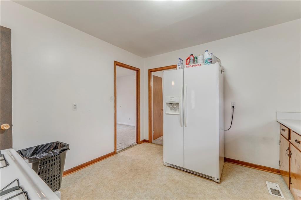 6 Don Drive Northeast Rome, GA 30165 - Photo 23 of 42 a view of storage and utility room with refrigerator and toys