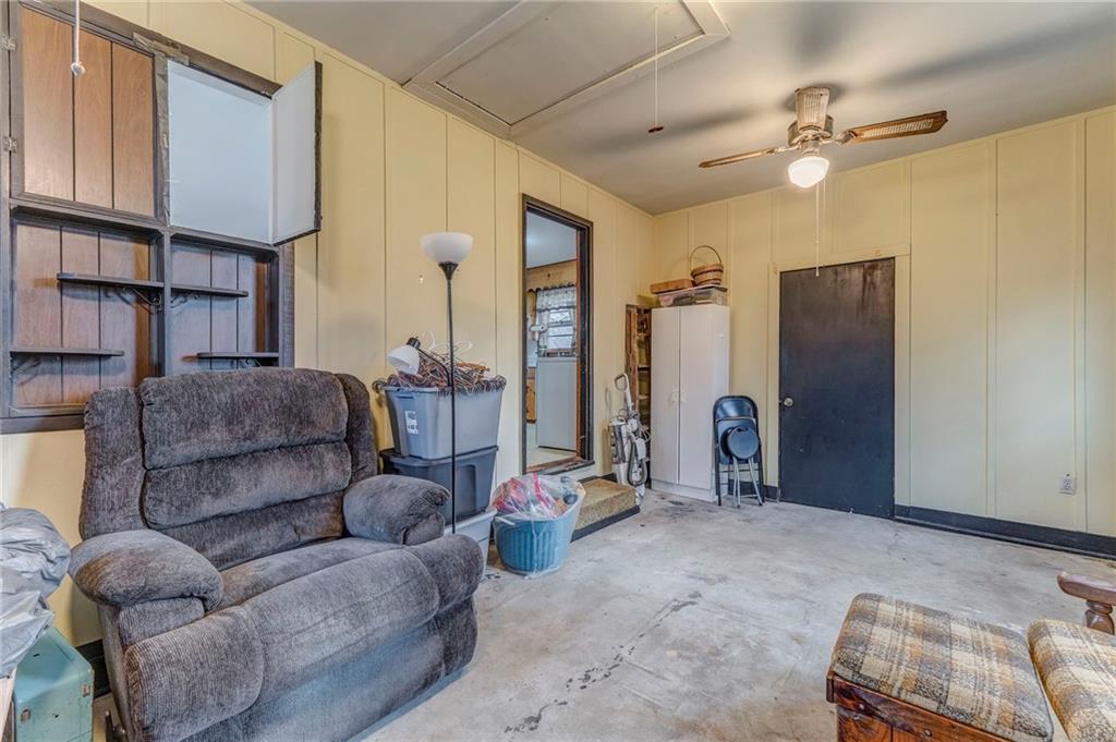 6 Don Drive Northeast Rome, GA 30165 - Photo 27 of 42 a living room with furniture a ceiling fan and a window