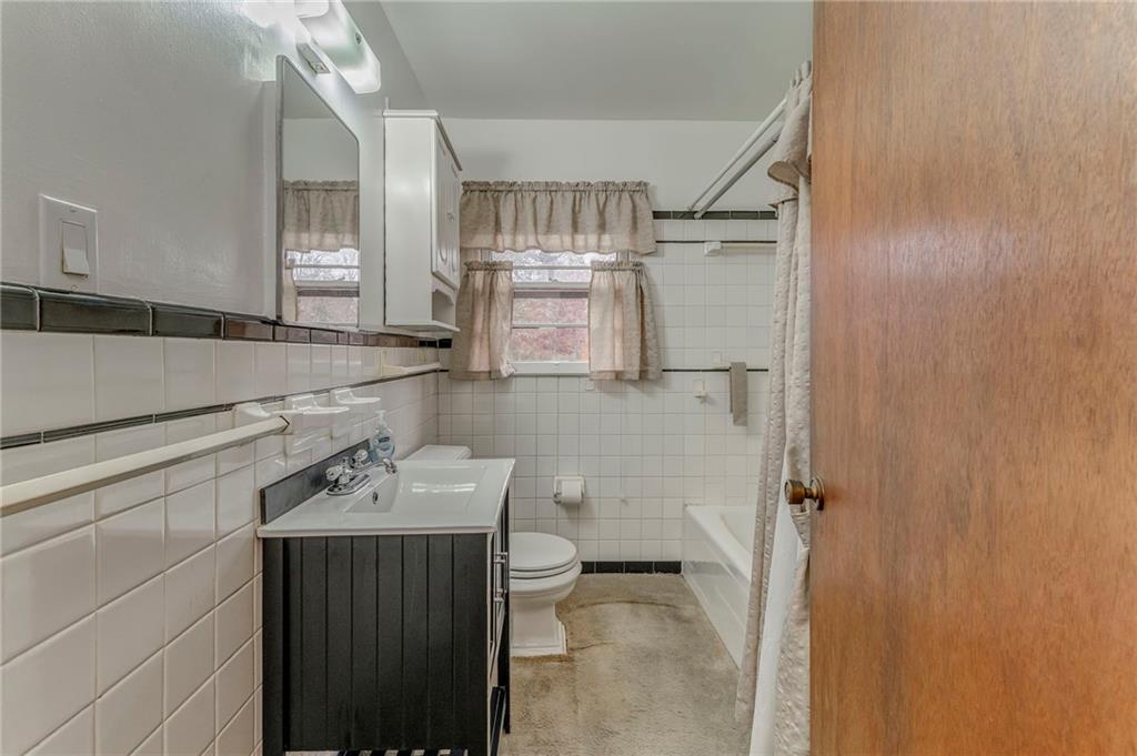 6 Don Drive Northeast Rome, GA 30165 - Photo 3 of 42 a bathroom with a sink toilet and shower