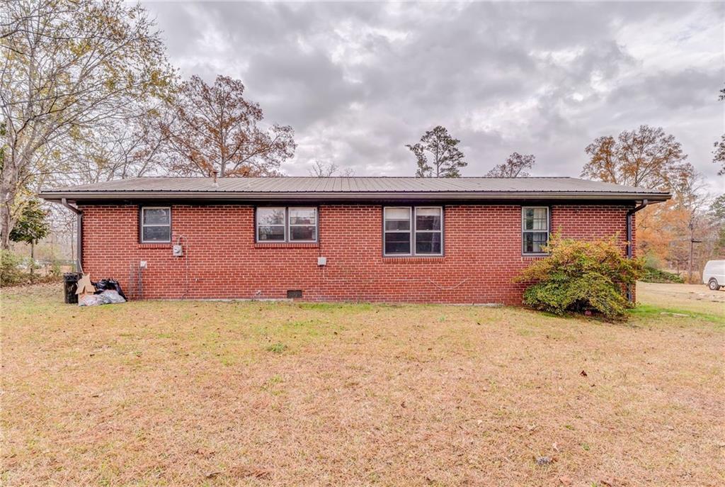 6 Don Drive Northeast Rome, GA 30165 - Photo 33 of 42 a front view of a house with garden