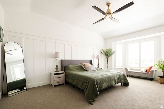 924 Country Lane Farmington, UT 84025 - Photo 23 of 91 Room featuring a bay window with plantation shutters, board and batten wall accent, and a ceiling fan with integrated lighting