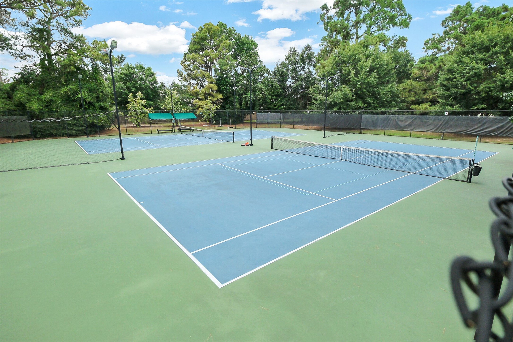 10003 Open Slope Court Humble, TX 77396 - Photo 22 of 25 Have you caught the pickleball craze yet? Tennis courts with pickleball options or classic tennis, this area is for you! Need lessons? They are available as well!