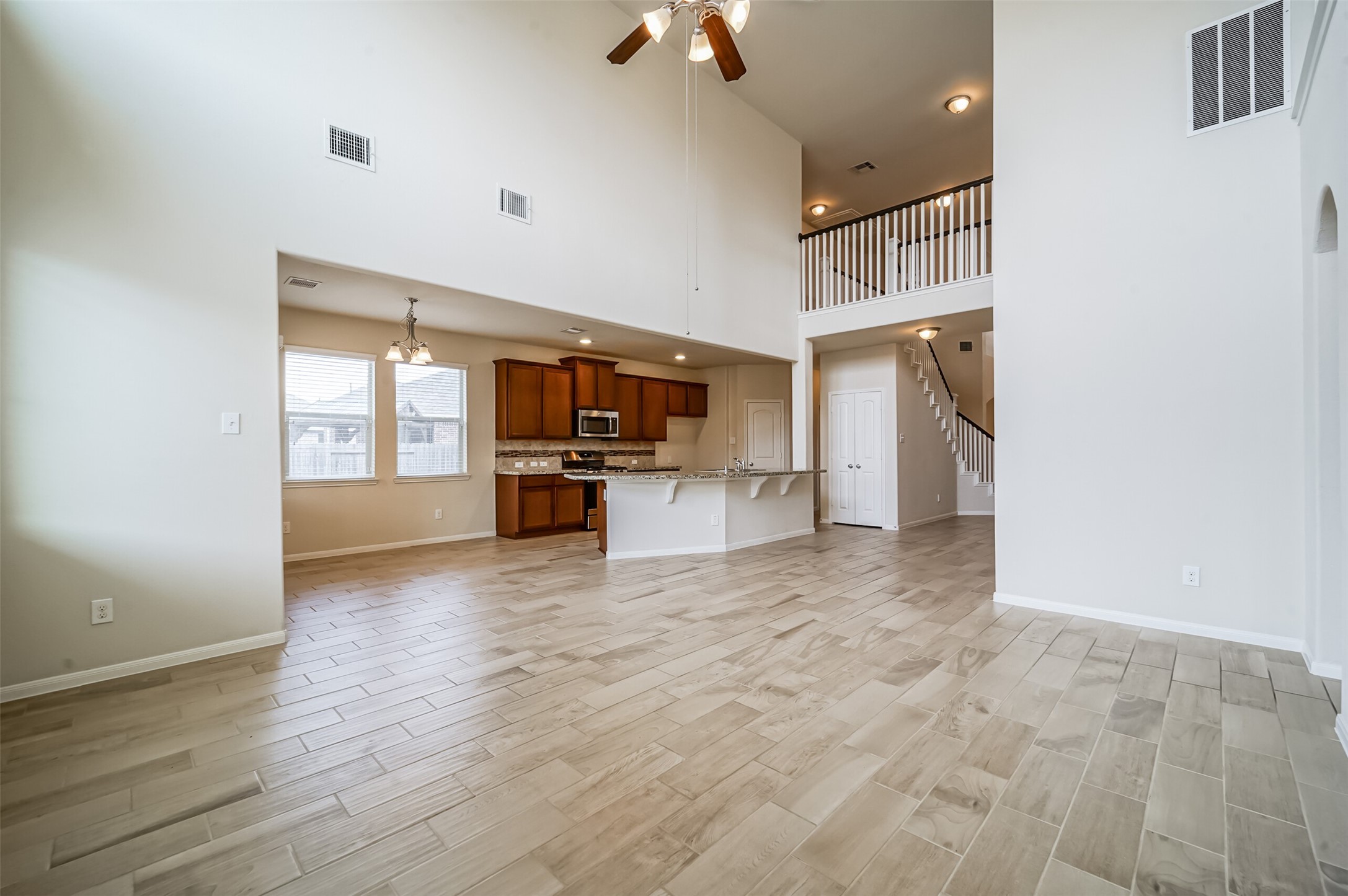 10003 Open Slope Court Humble, TX 77396 - Photo 24 of 25 Another view of the open floorplan. So much natural light!