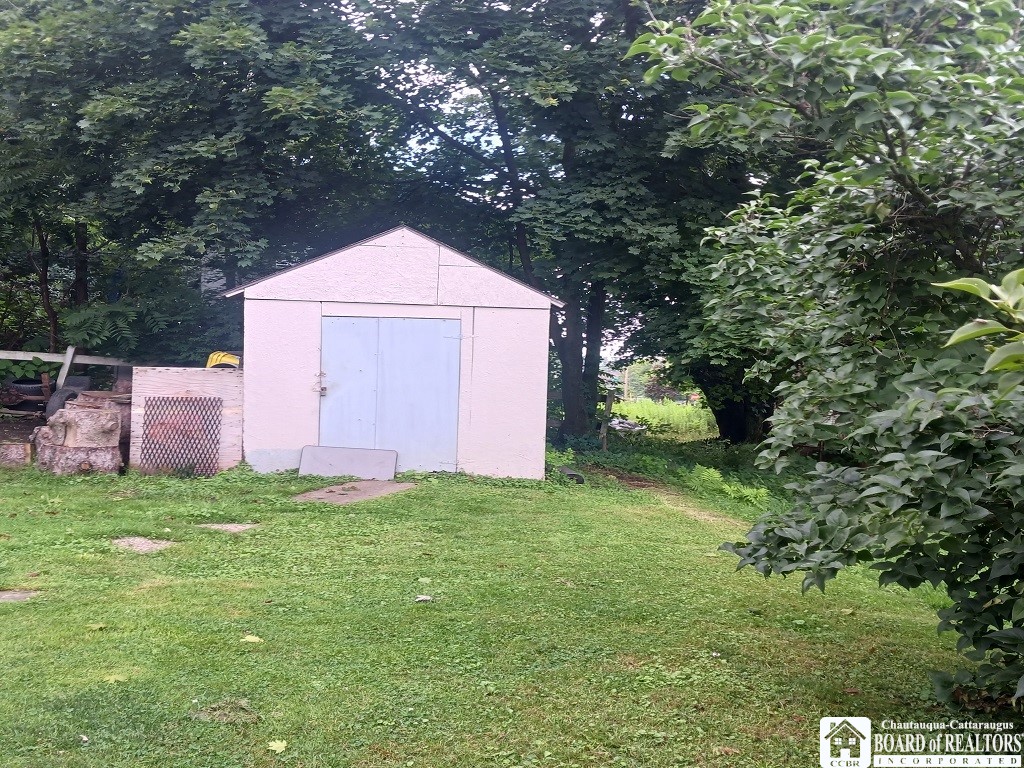 617 Spring Street Jamestown, NY 14701 - Photo 2 of 9 Back yard shed