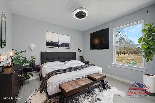a view of yard covered with snow in back yard