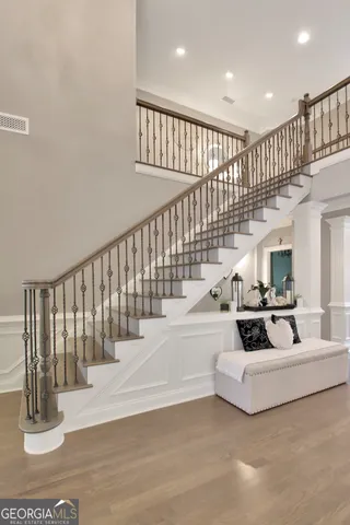 a view of living room with furniture and a fireplace