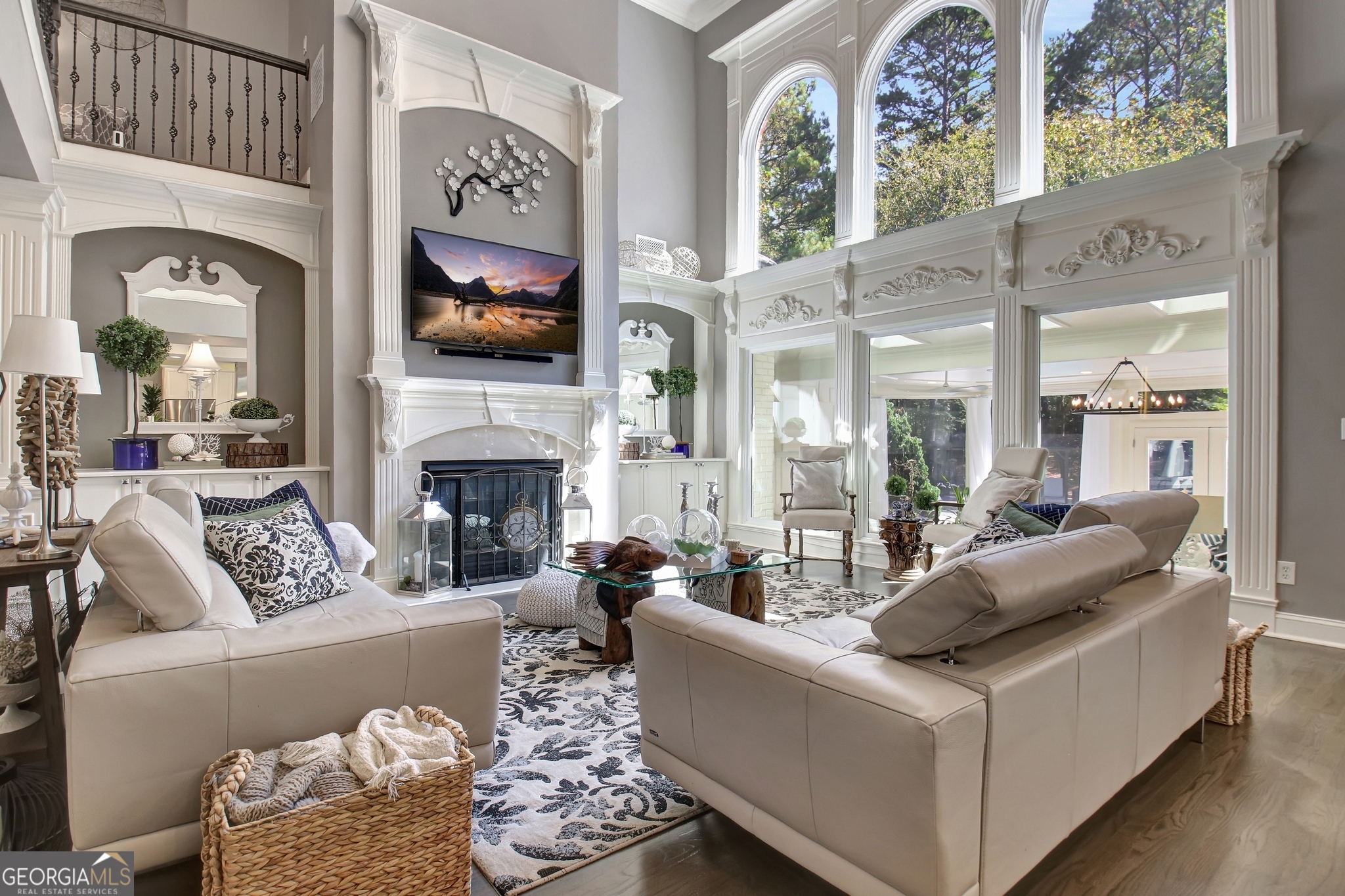 804 Ridgestone Court Peachtree City, GA 30269 - Photo 24 of 83 a living room with furniture a flat screen tv and a fireplace