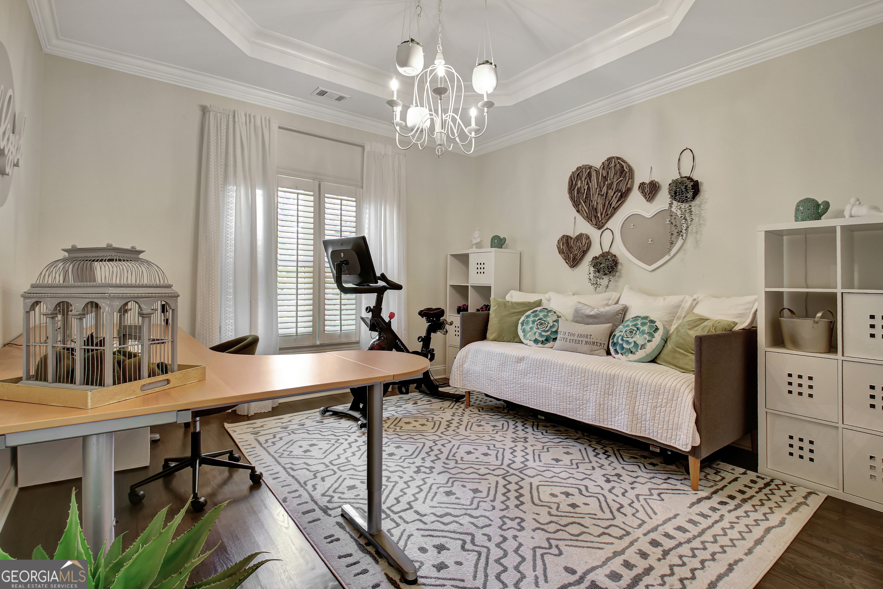804 Ridgestone Court Peachtree City, GA 30269 - Photo 50 of 83 a living room with furniture and a chandelier