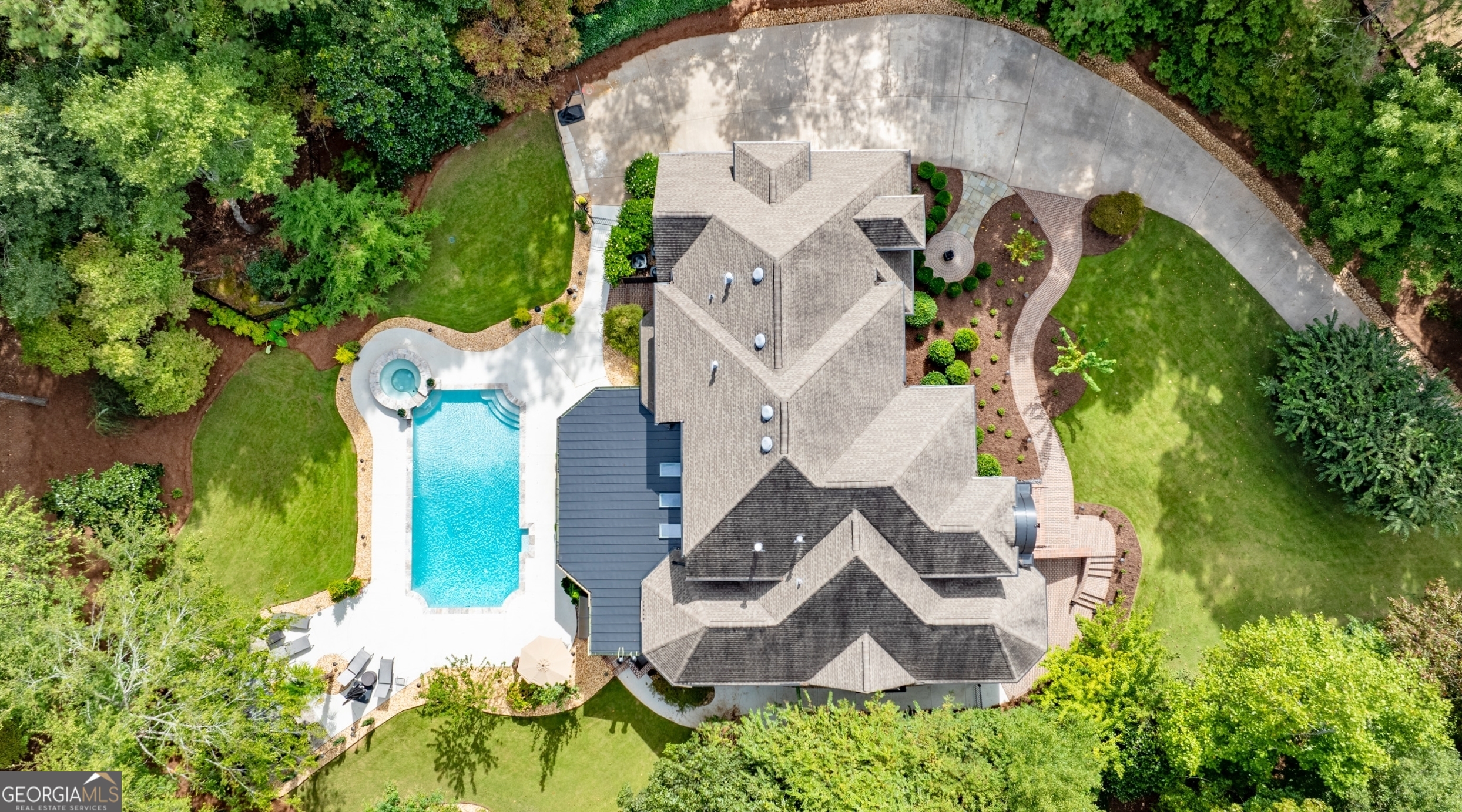 804 Ridgestone Court Peachtree City, GA 30269 - Photo 5 of 83 an aerial view of a house with swimming pool and outdoor space