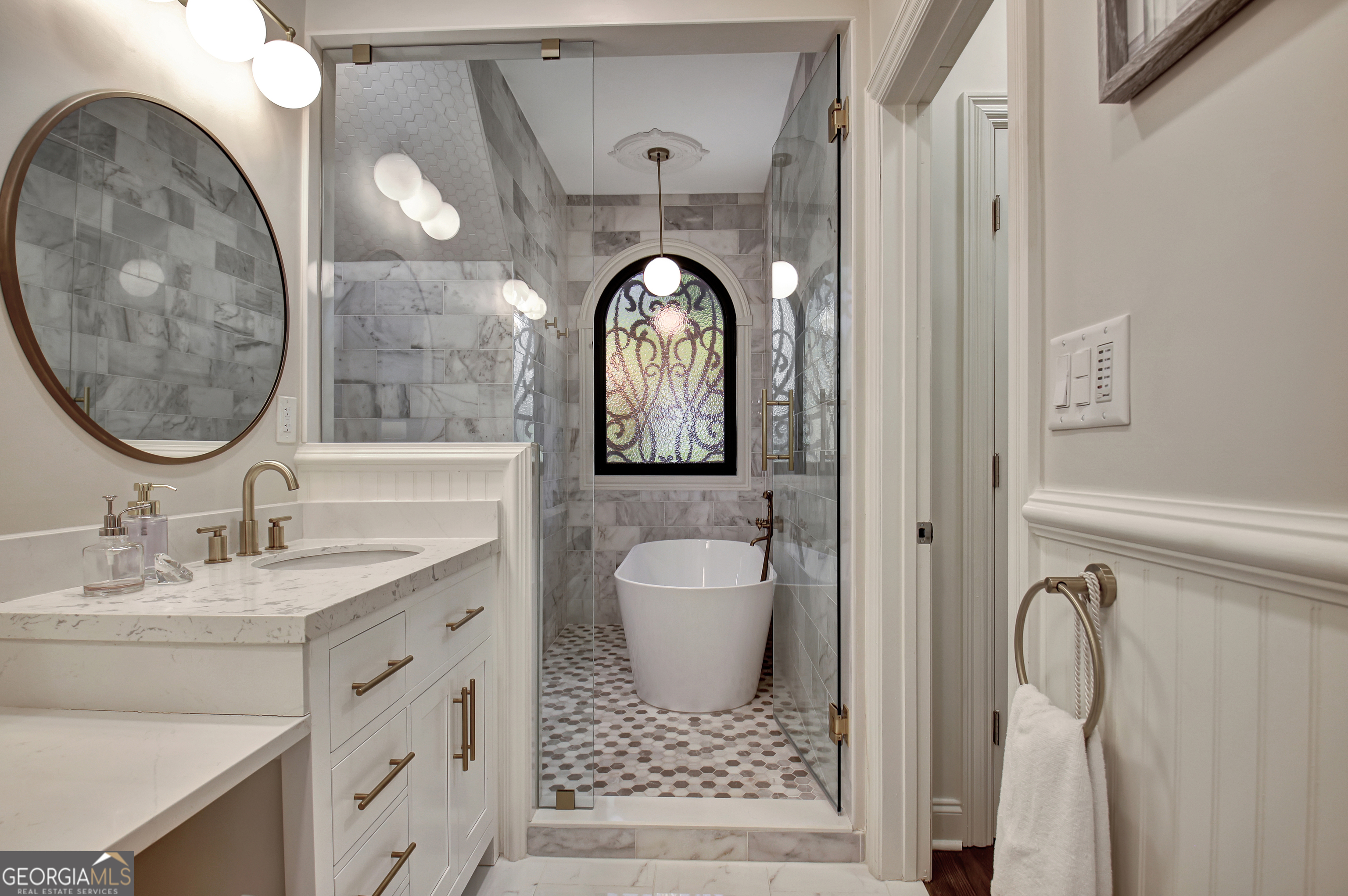 804 Ridgestone Court Peachtree City, GA 30269 - Photo 57 of 83 a bathroom with a sink and a mirror