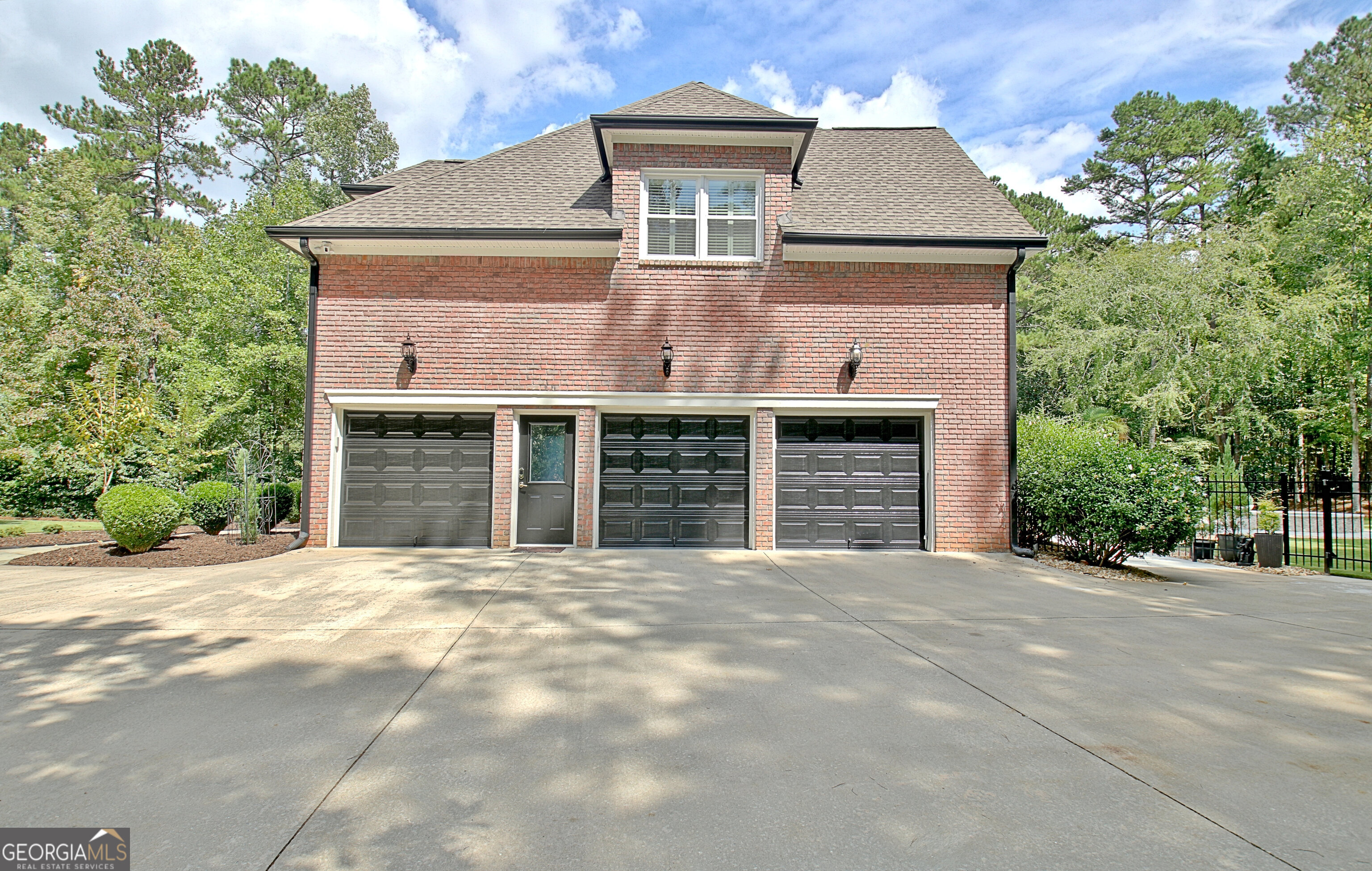 804 Ridgestone Court Peachtree City, GA 30269 - Photo 9 of 83 a front view of a house with yard and trees