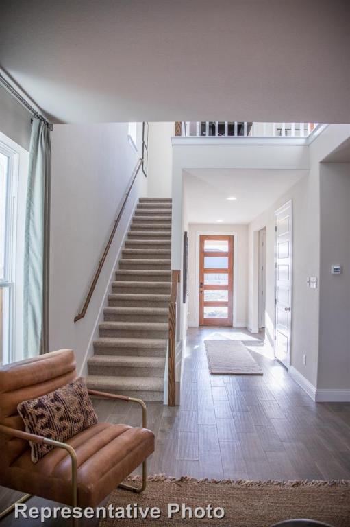 164 Linnet Lane Maxwell, TX 78656 - Photo 25 of 40 a view of entryway and hall with wooden floor