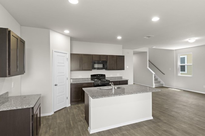 164 Linnet Lane Maxwell, TX 78656 - Photo 4 of 40 a living room with furniture and a wooden floor
