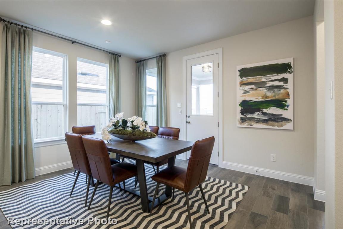 164 Linnet Lane Maxwell, TX 78656 - Photo 7 of 40 a view of a dining room with furniture window and outside view