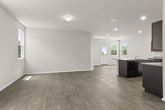 164 Linnet Lane Maxwell, TX 78656 - Photo 40 of 40 a view of kitchen with wooden floor and electronic appliances