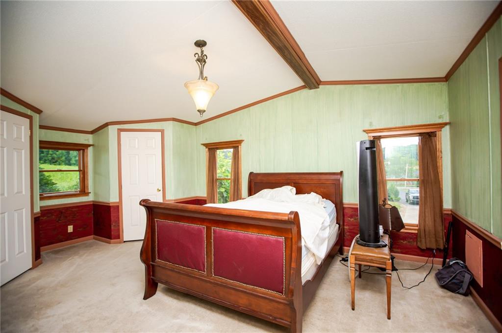 250 Anderson Road Butler, PA 16002 - Photo 5 of 14 a bedroom with a bed and a table chair