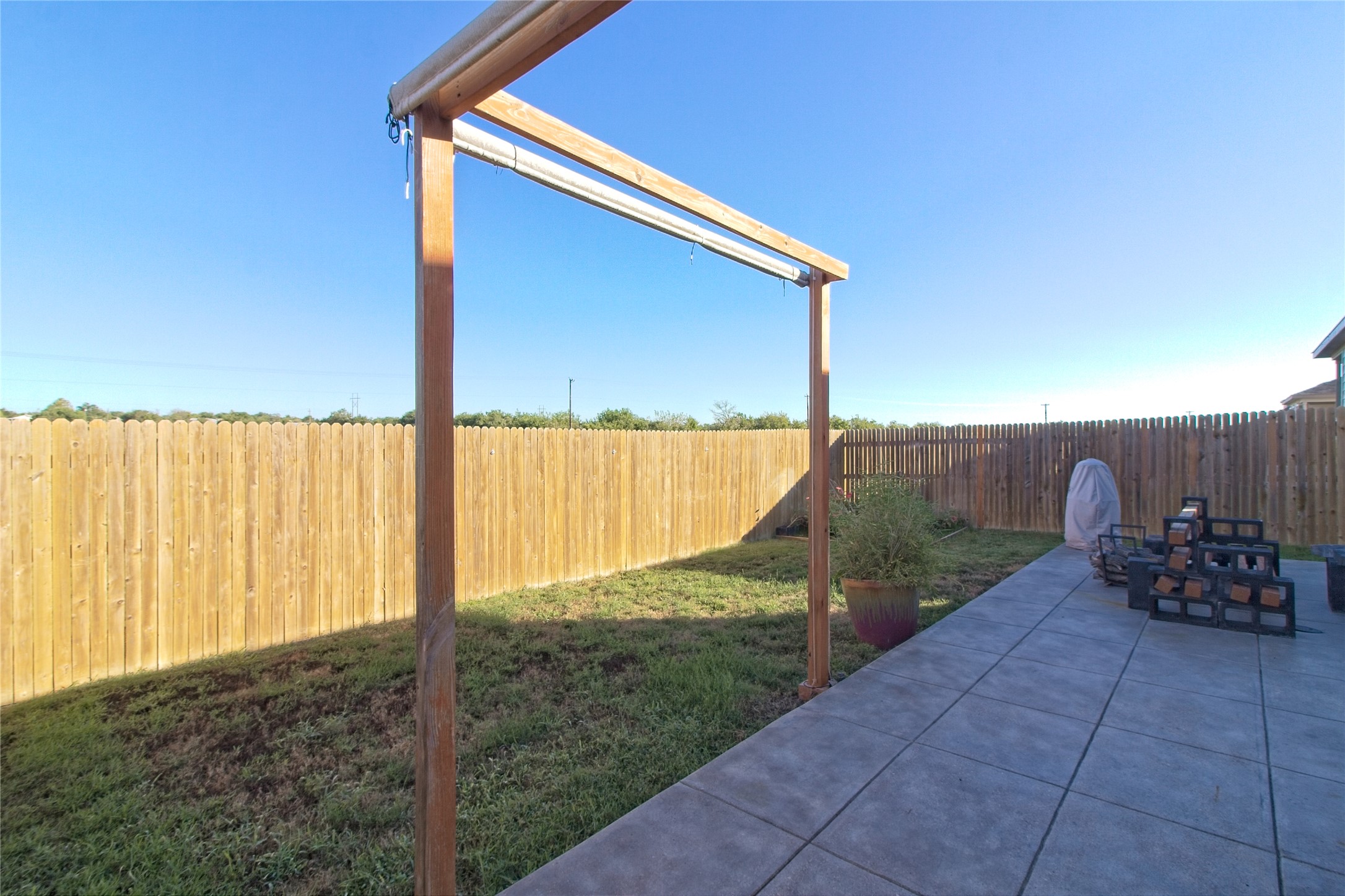 505 Greatest Gift Way Jarrell, TX 76537 - Photo 27 of 30 Fenced backyard featuring a patio