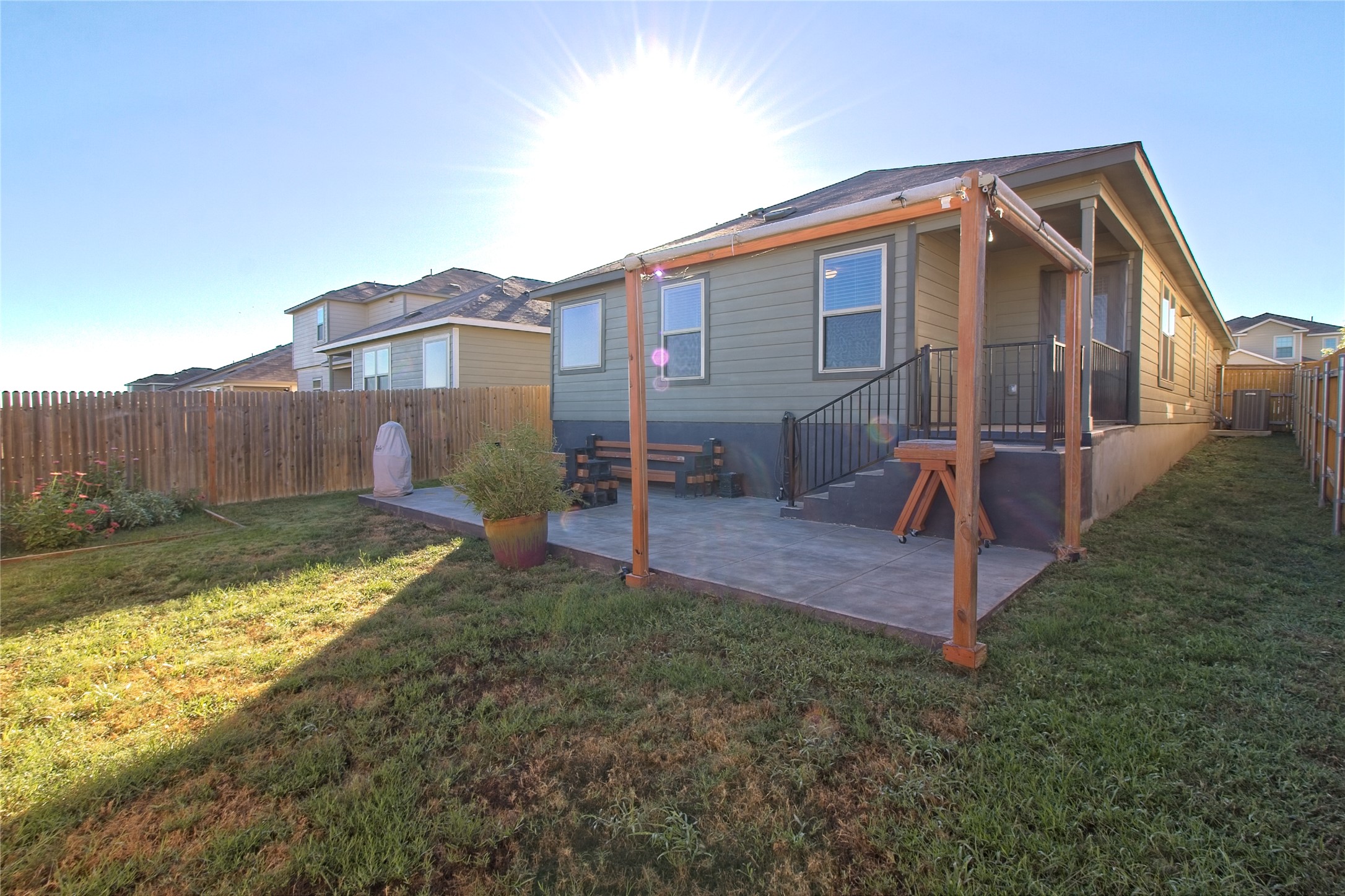 505 Greatest Gift Way Jarrell, TX 76537 - Photo 28 of 30 Rear view of house with a patio and a fenced backyard