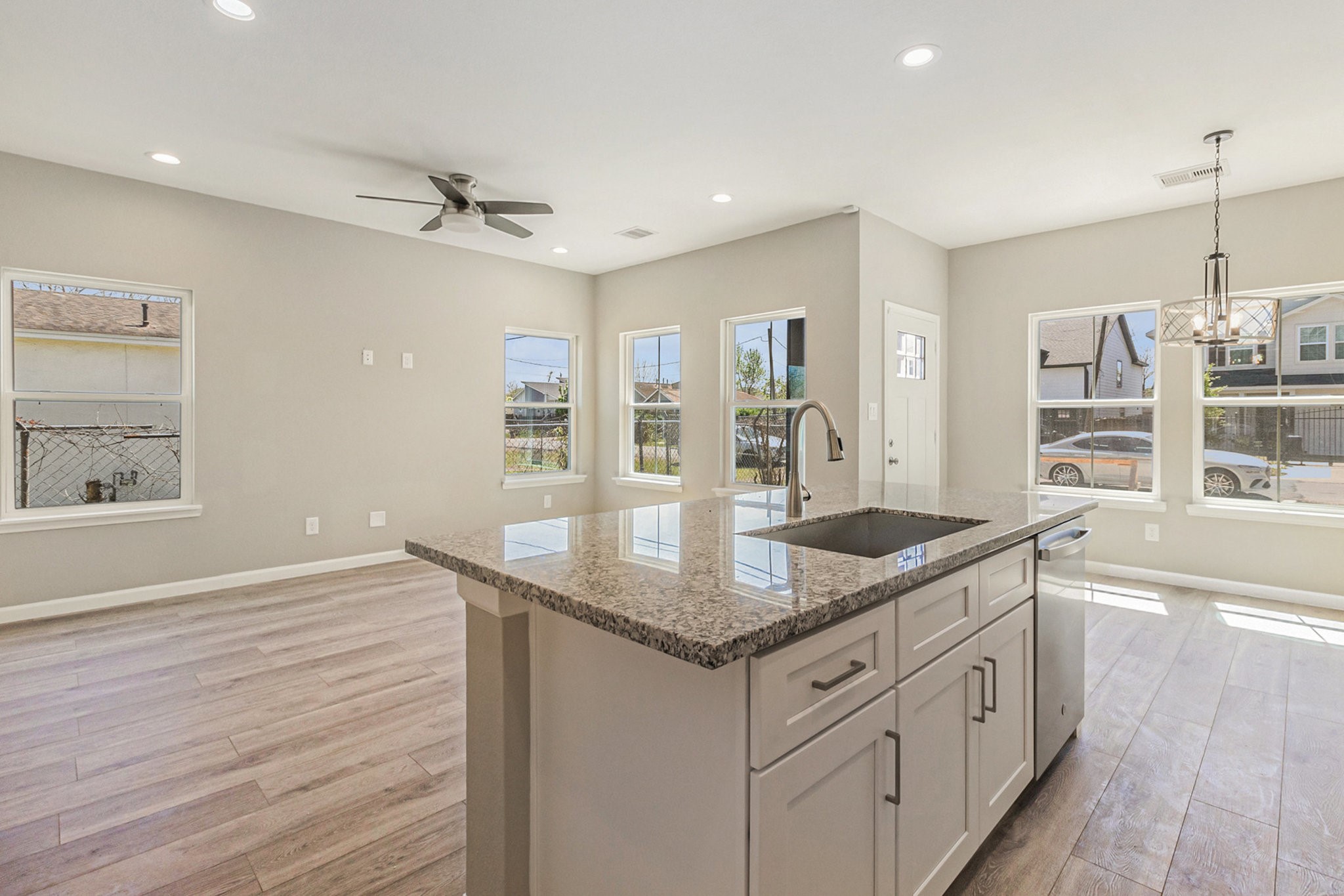 4645 Larkspur Street Houston, TX 77051 - Photo 9 of 16 a kitchen with granite countertop counter space a sink and a window