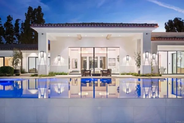 a room with lots of table and chairs